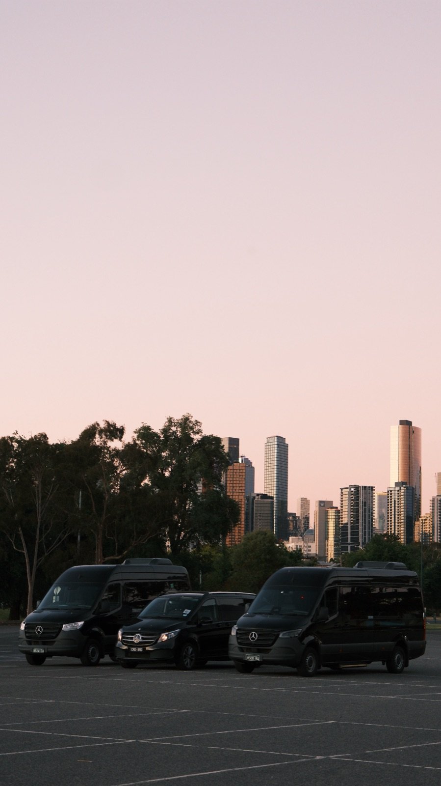 TransfersX fleet against the Melbourne skyline